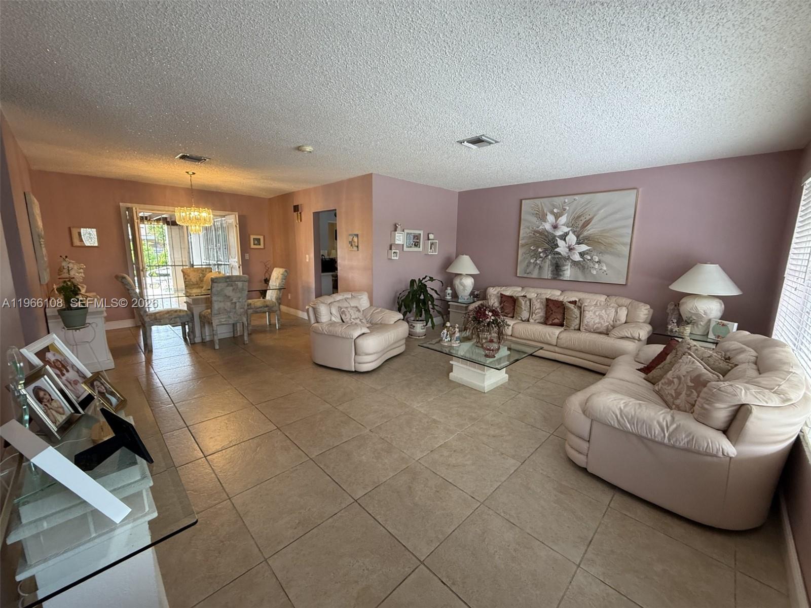 4012 Southwest 102nd Court Miami, FL 33165 - Photo 3 of 10 a living room with furniture