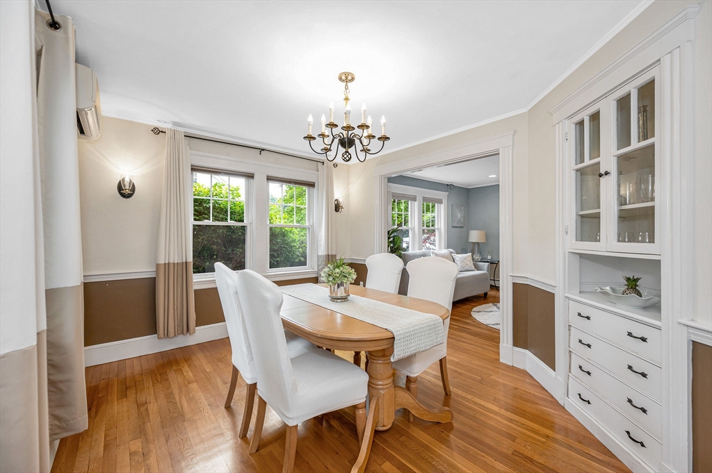 35 Warren Avenue Reading, MA 01867 - Photo 11 of 41 a view of a dining room with furniture window and wooden floor