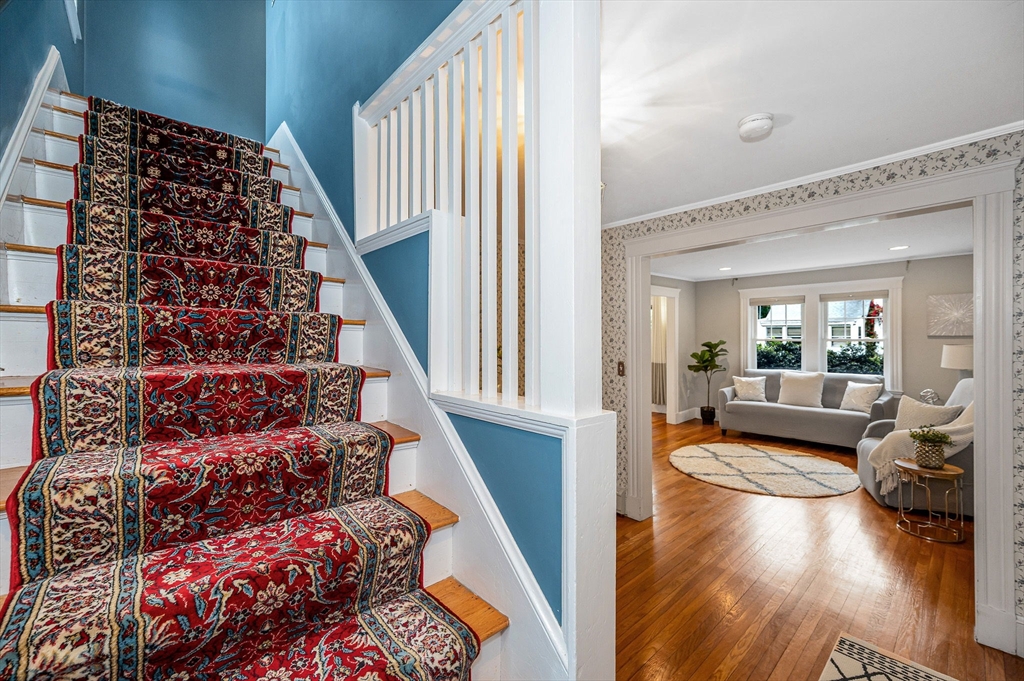 35 Warren Avenue Reading, MA 01867 - Photo 19 of 41 a living room with furniture and a large window