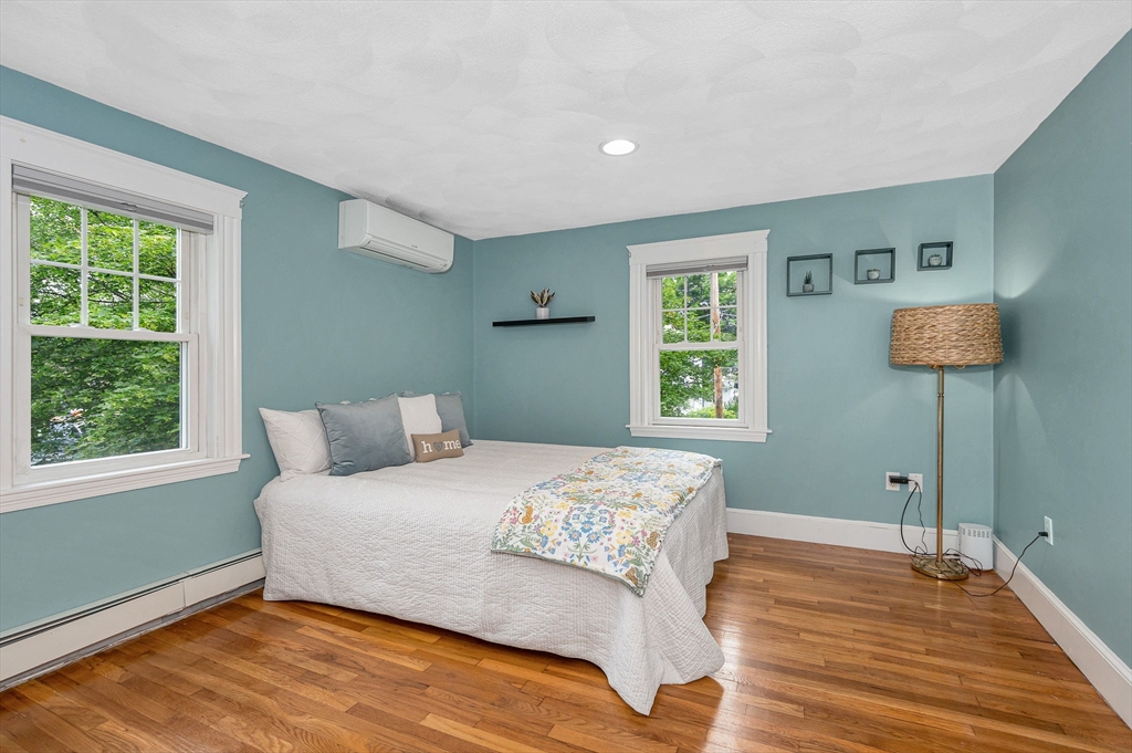 35 Warren Avenue Reading, MA 01867 - Photo 24 of 41 a bedroom with a bed and a window