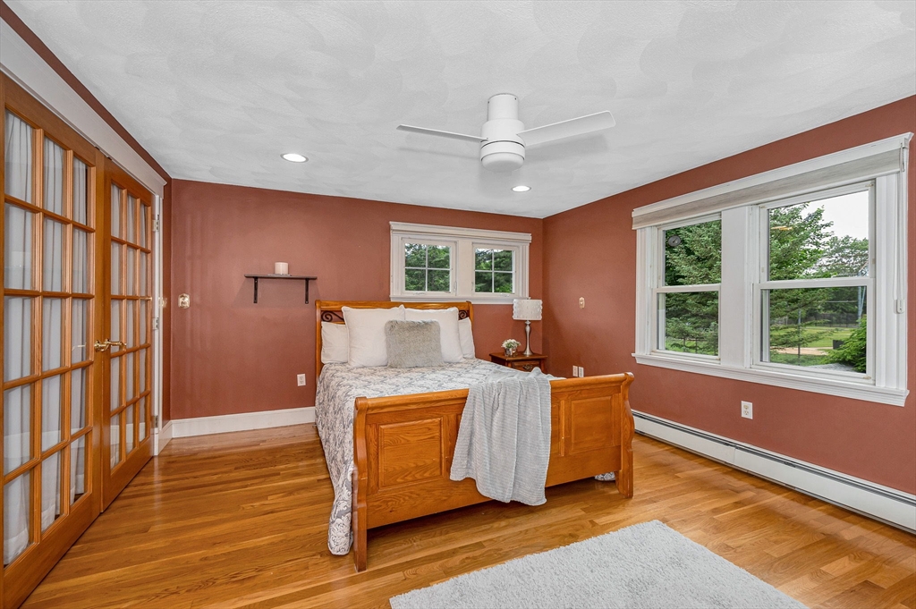 35 Warren Avenue Reading, MA 01867 - Photo 25 of 41 a bed room with a bed and a window