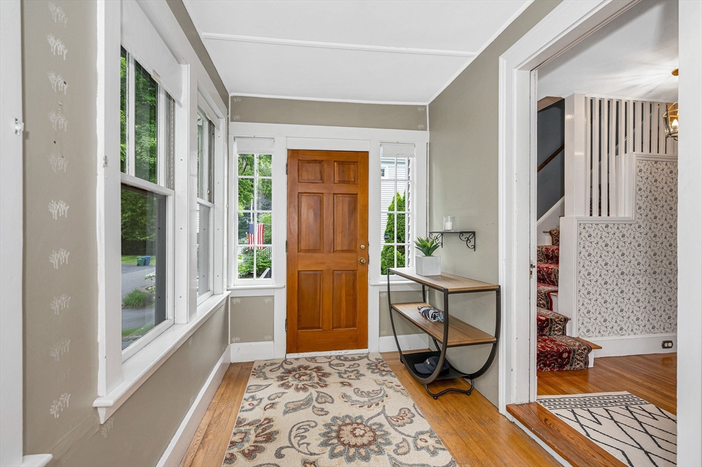 35 Warren Avenue Reading, MA 01867 - Photo 3 of 41 a view of a bedroom with furniture and windows