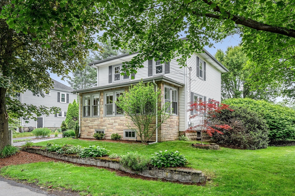 35 Warren Avenue Reading, MA 01867 - Photo 31 of 41 front view of house with a yard
