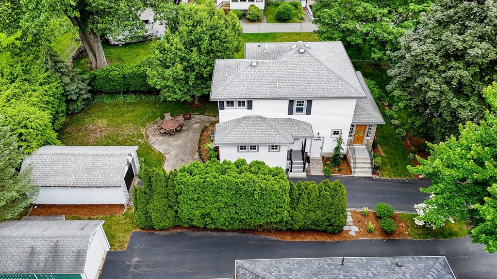 35 Warren Avenue Reading, MA 01867 - Photo 39 of 41 an aerial view of a house with a garden