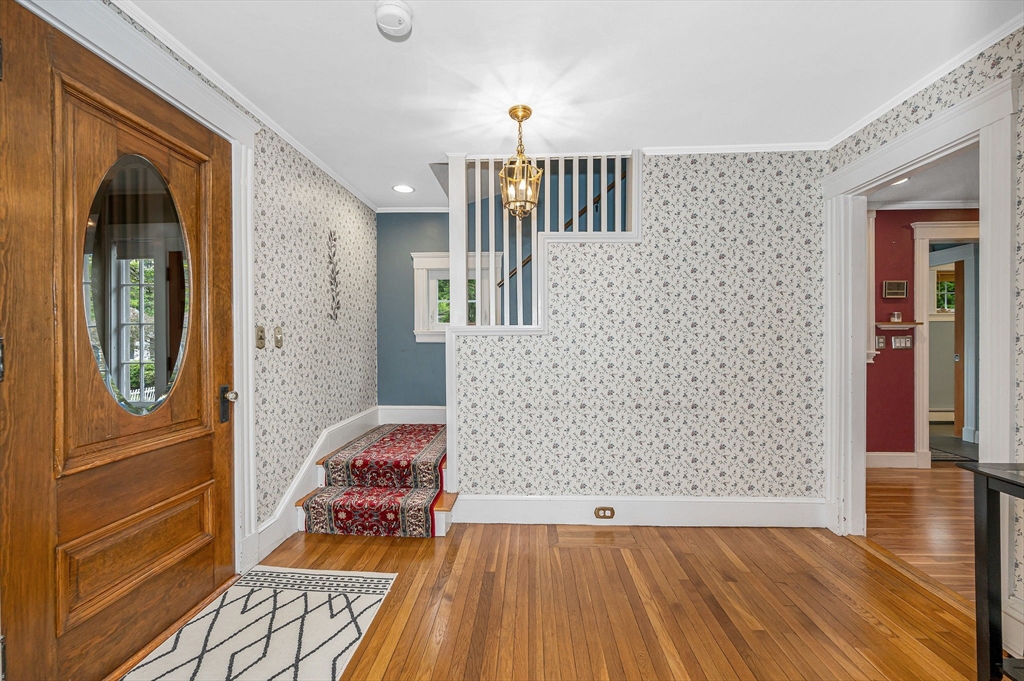 35 Warren Avenue Reading, MA 01867 - Photo 5 of 41 a view of livingroom with furniture and wooden floor