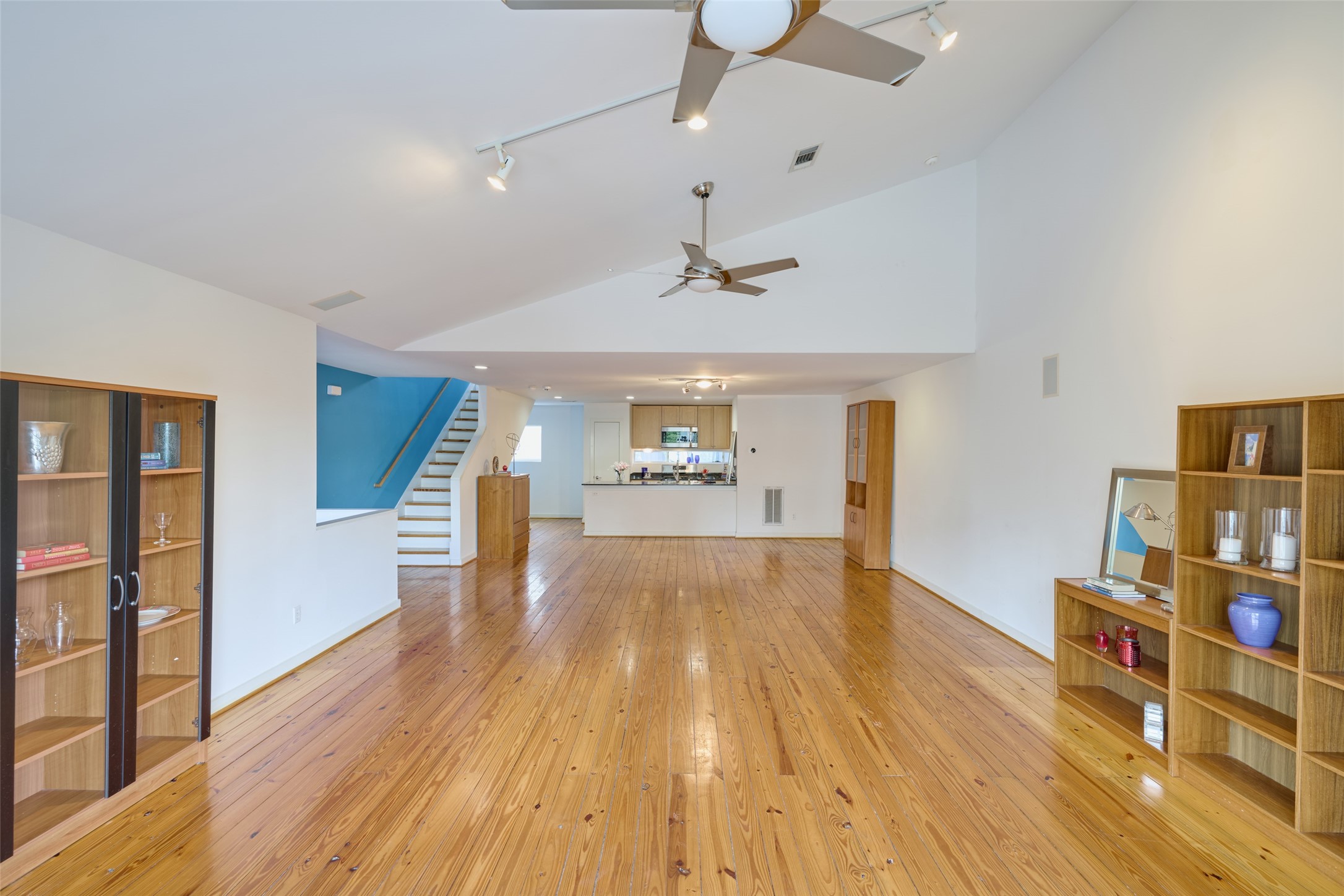 2811 Crawford Street Houston, TX 77004 - Photo 14 of 37 a view of empty room with wooden floor