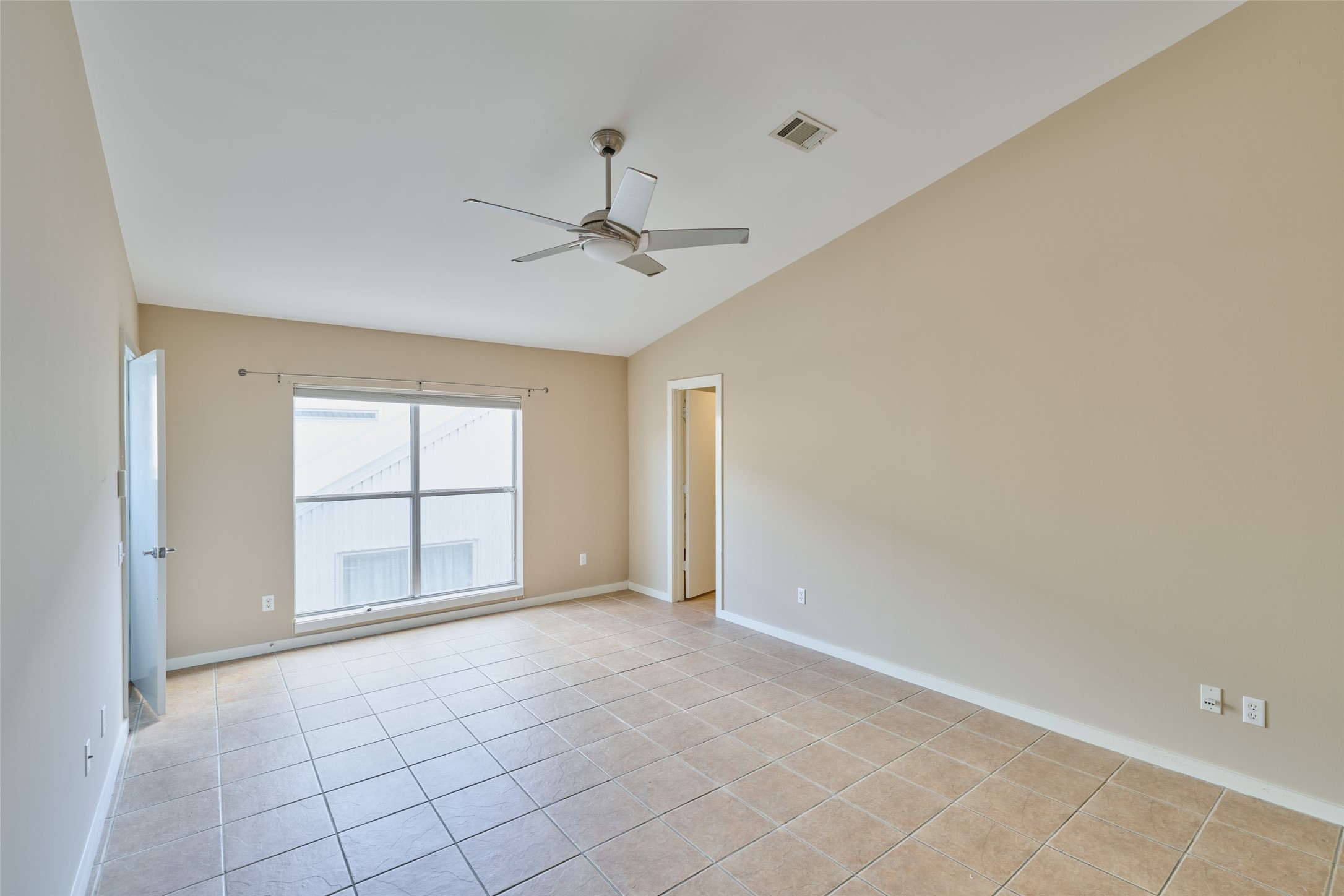 2811 Crawford Street Houston, TX 77004 - Photo 23 of 37 a view of an empty room with a window