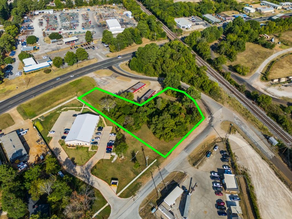 3208 West Loop 281 Longview, TX 75604 - Photo 3 of 18 Vacant land parcel featuring mature trees and direct road frontage