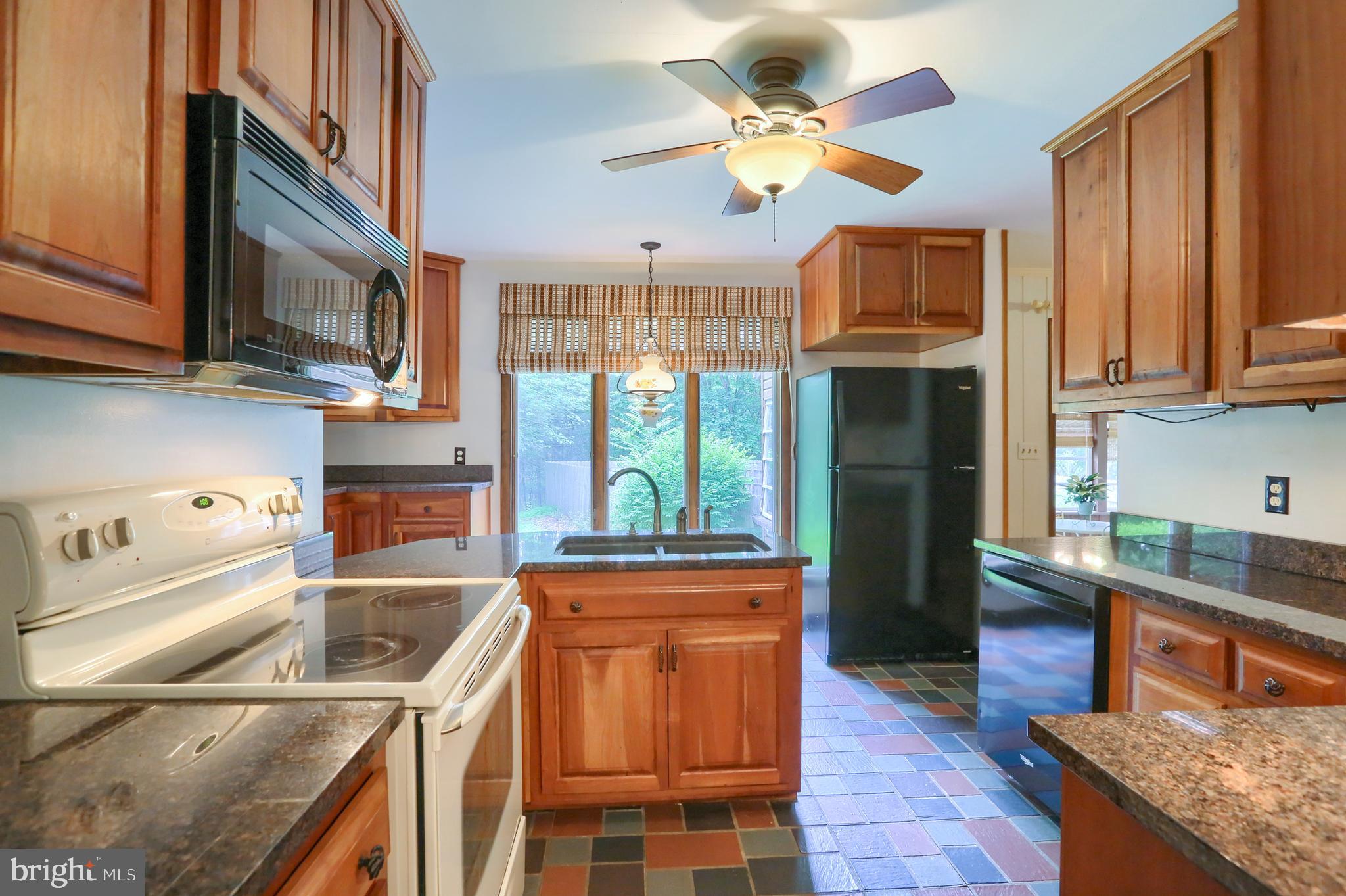57 Huggins Road Duncannon, PA 17020 - Photo 8 of 43 Cherry cabinets in kitchen