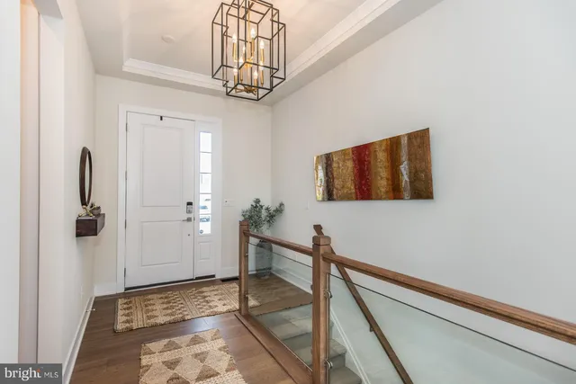 a living room with a fireplace and a flat screen tv