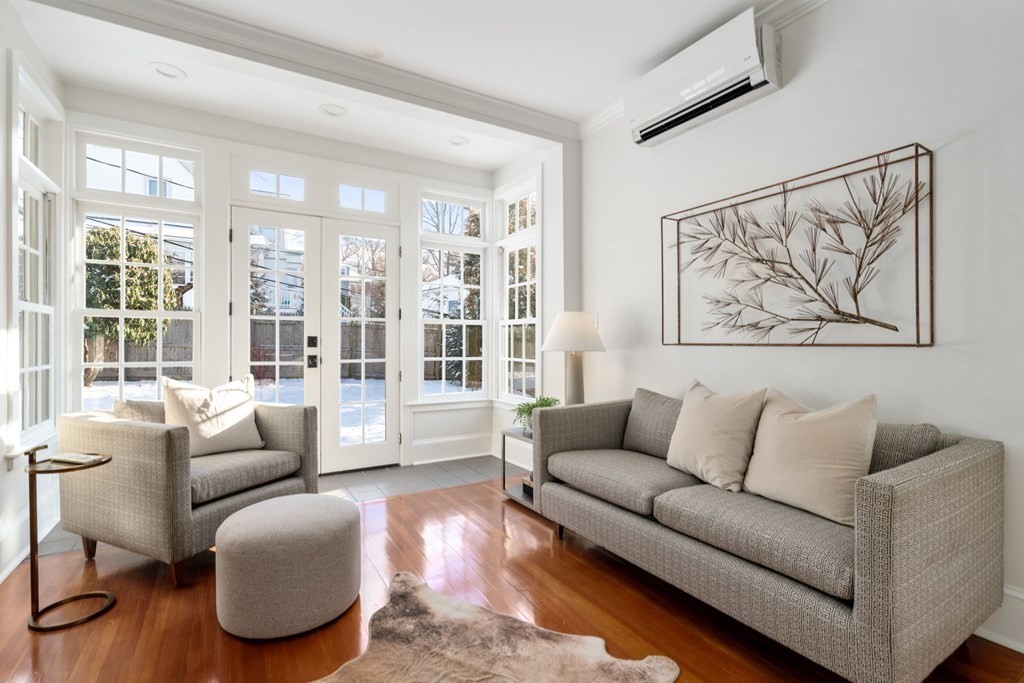 24 Maxfield Street Boston, MA 02132 - Photo 11 of 36 a living room with furniture and a large window