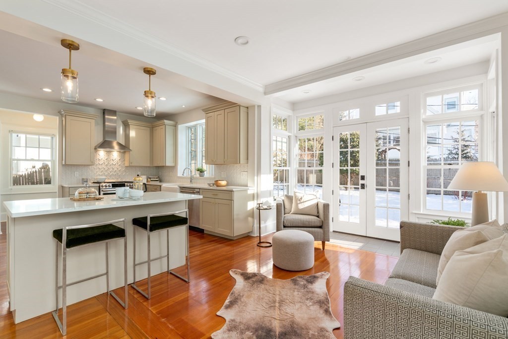 24 Maxfield Street Boston, MA 02132 - Photo 12 of 36 a living room with furniture and a large window