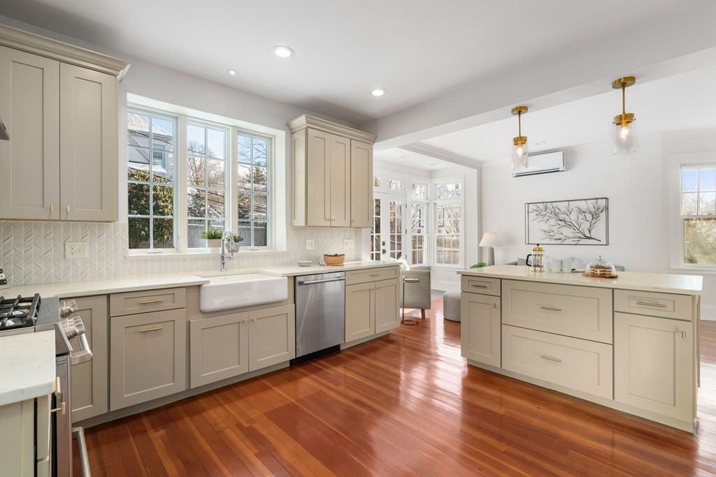 24 Maxfield Street Boston, MA 02132 - Photo 17 of 36 a large kitchen with a lot of counter space and a wooden floor