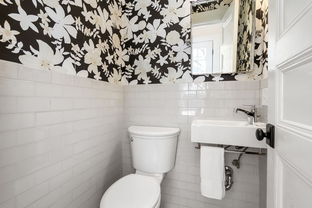 24 Maxfield Street Boston, MA 02132 - Photo 20 of 36 a bathroom with a toilet and a sink