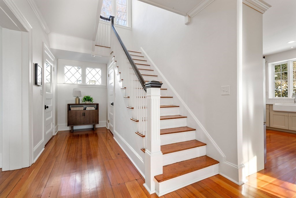 24 Maxfield Street Boston, MA 02132 - Photo 4 of 36 a view of entryway with wooden floor