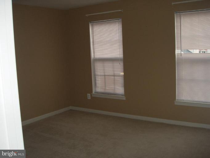 1307 Destrier Street Ranson, WV 25438 - Photo 11 of 15 a room that has a window in it