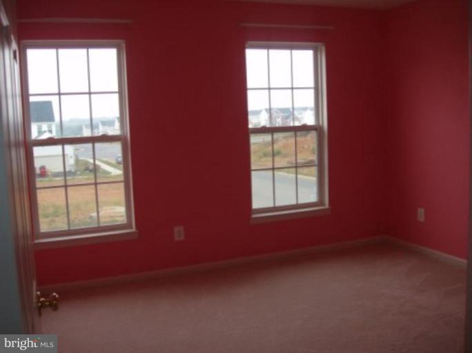 1307 Destrier Street Ranson, WV 25438 - Photo 10 of 15 an empty room with a window