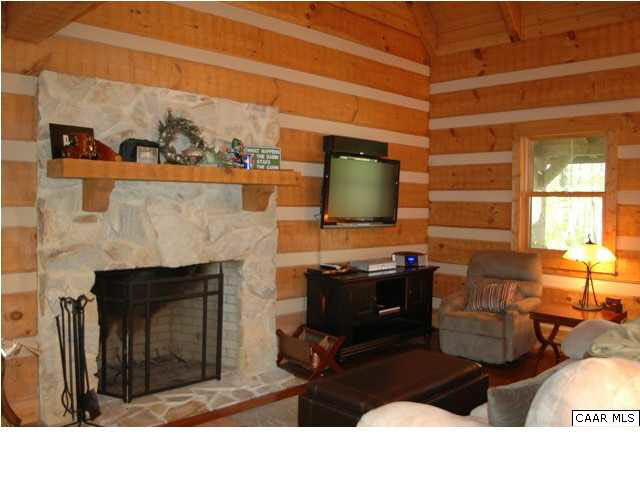1208 Duet Road Madison, VA 22727 - Photo 14 of 29 a living room with furniture and a fireplace
