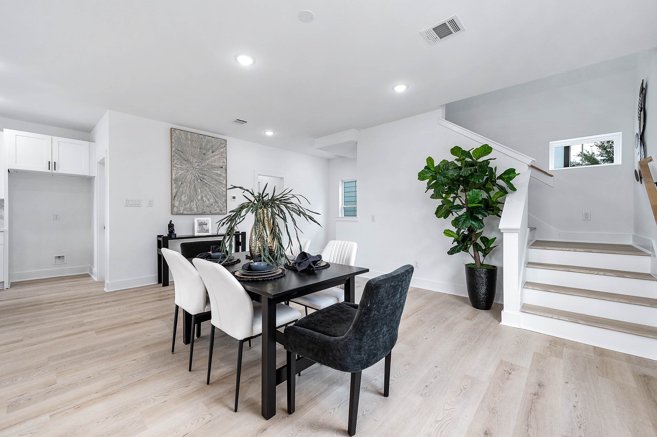 1515 Euel Street Houston, TX 77009 - Photo 34 of 34 Dining area perfectly positioned within the open floor plan, offering an inviting space for meals and gatherings.