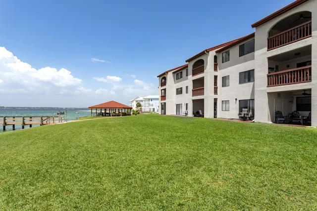 a front view of a residential apartment building with entryway