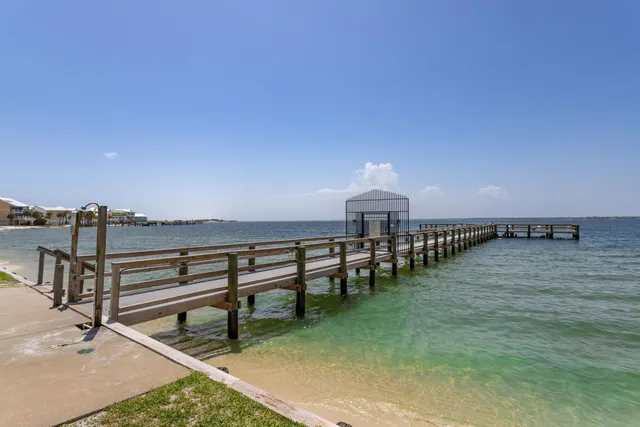 a view of a street with a building in the background