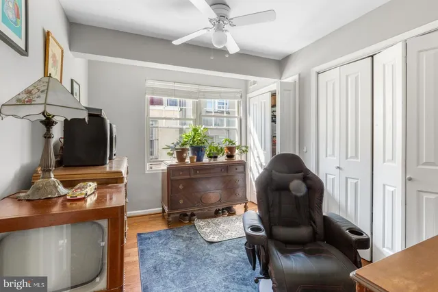 a room with furniture and a flat screen tv