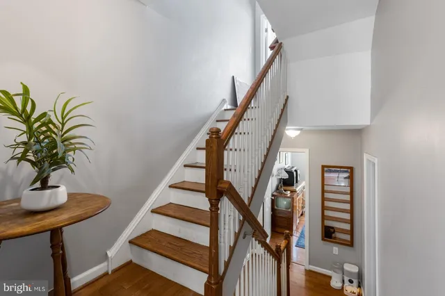 a view of entryway with wooden floor