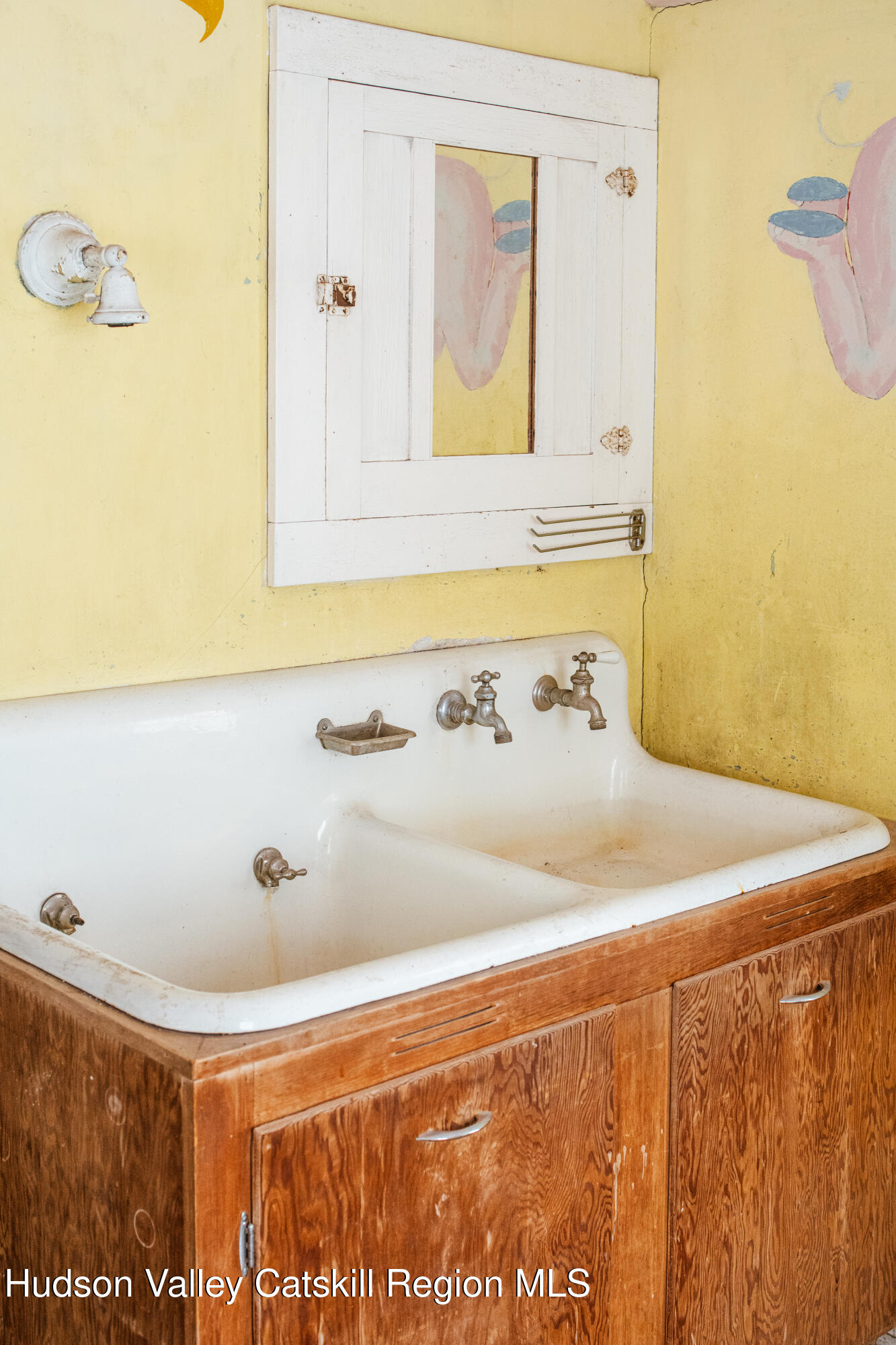 5020 Vega Mountain Road Roxbury, NY 12474 - Photo 20 of 31 a bathroom with a sink and a mirror