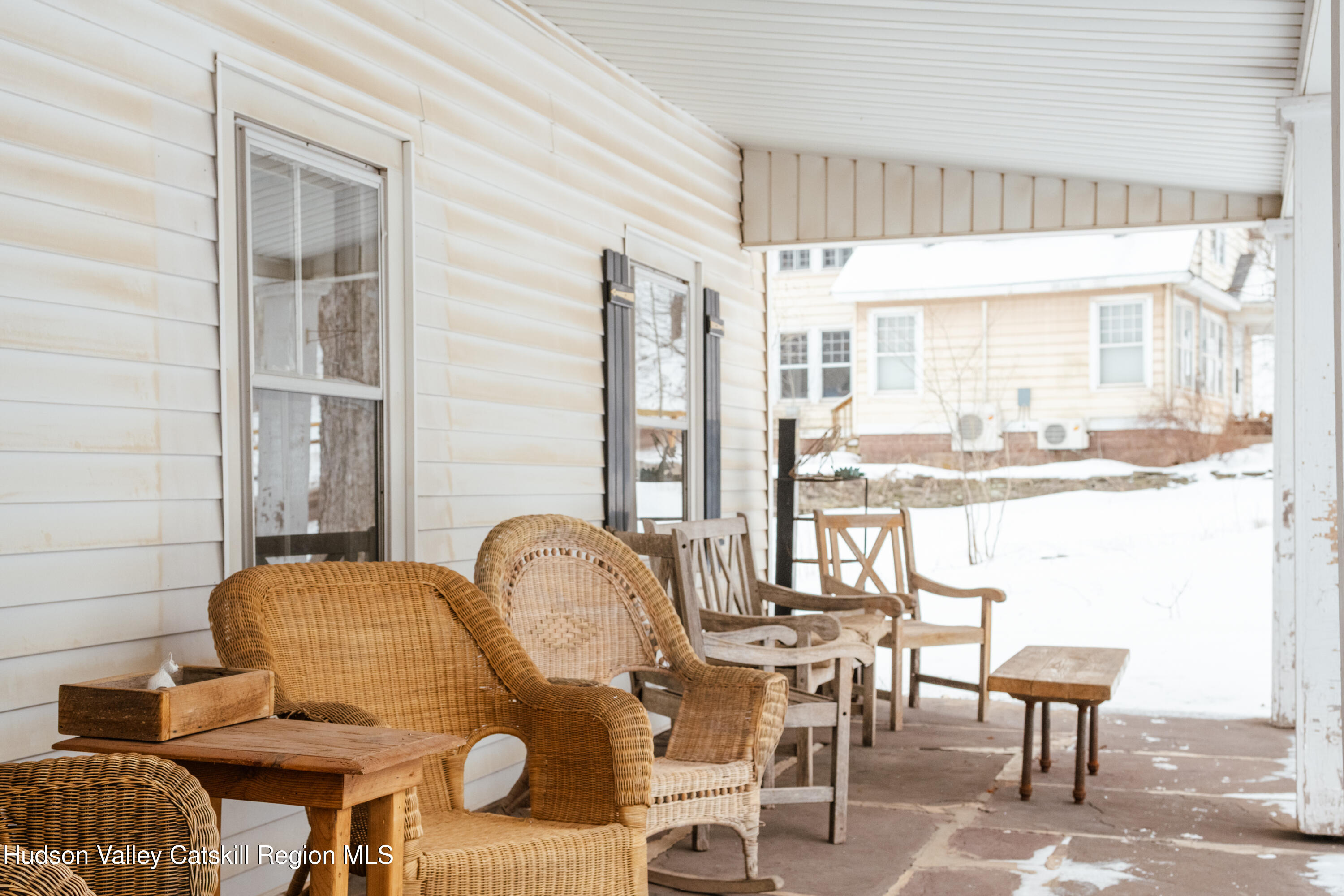 5020 Vega Mountain Road Roxbury, NY 12474 - Photo 24 of 31 a dining room with furniture and large windows