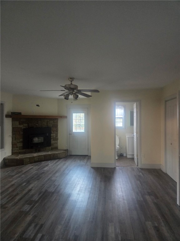 1051 Gage Drive Winder, GA 30680 - Photo 12 of 23 Living room with door on left going to back porch. Center door leads to full bath. Double doors on right contain washer/dryer (included with rental).