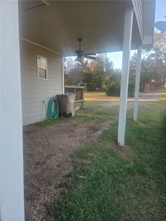 1051 Gage Drive Winder, GA 30680 - Photo 4 of 23 Covered carport with paved driveway for parking 2 additional vehicles.