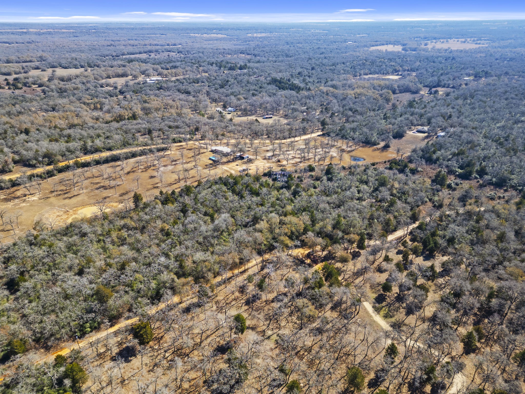 336 Starlight Path Caldwell, TX 77836 - Photo 16 of 16 an aerial view of residential houses with outdoor space