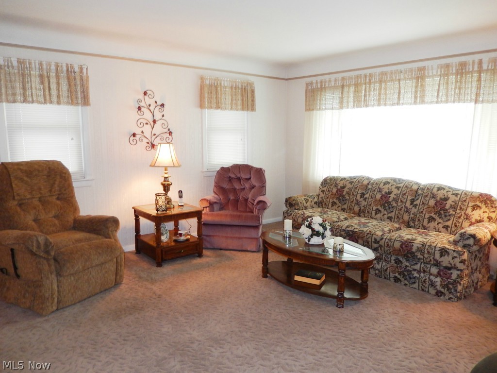 2318 Keystone Road Cleveland, OH 44134 - Photo 4 of 24 Living Room with Hardwood Under Carpet
