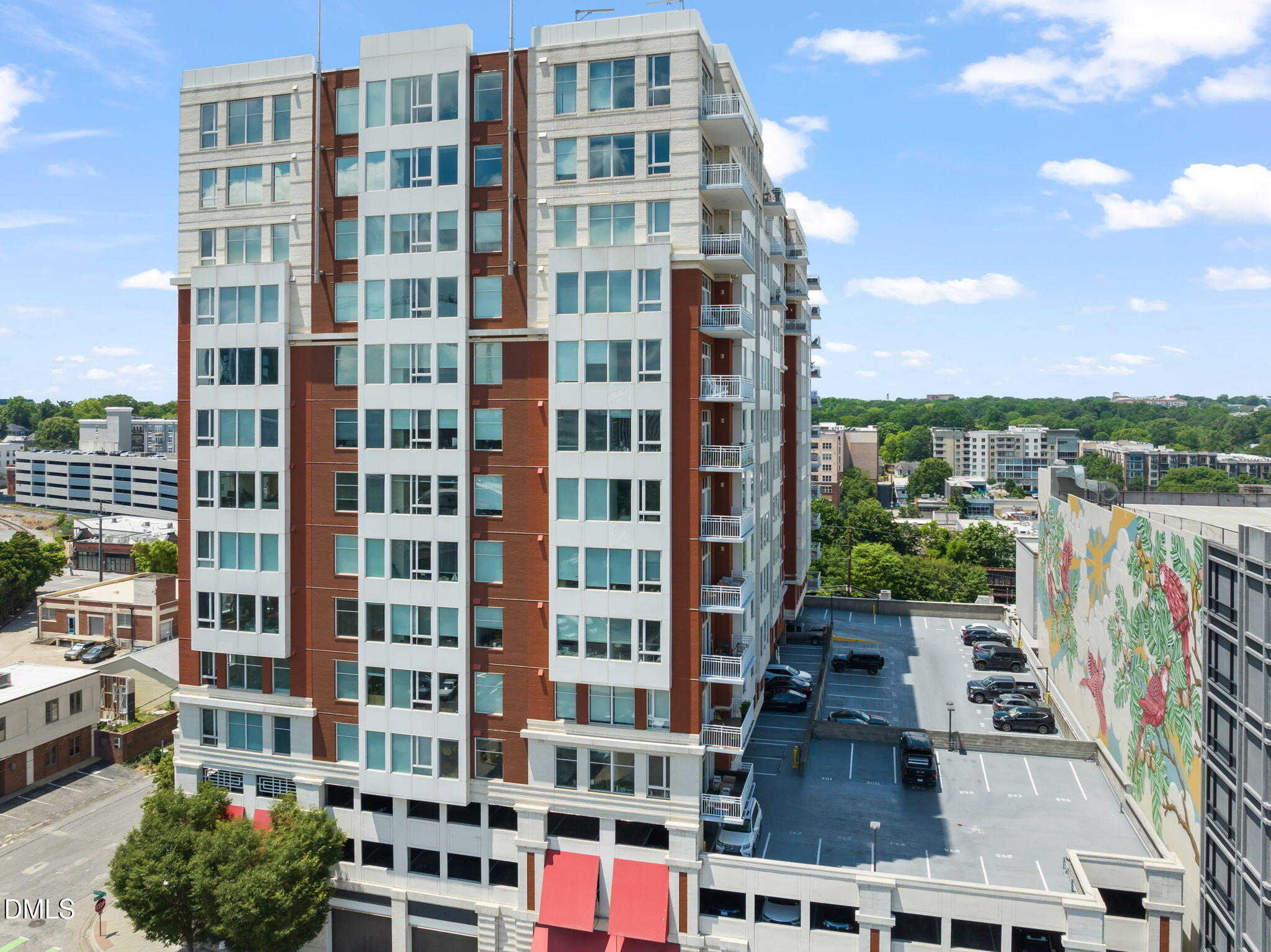 400 West North Street, Unit 1218 Raleigh, NC 27603 - Photo 35 of 41 a view of a building with glass windows
