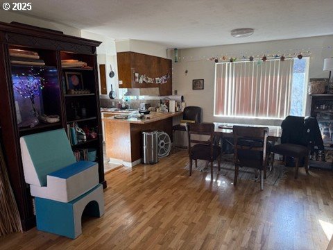 170 East 40th Avenue Eugene, OR 97405 - Photo 5 of 10 a living room with furniture and a wooden floor