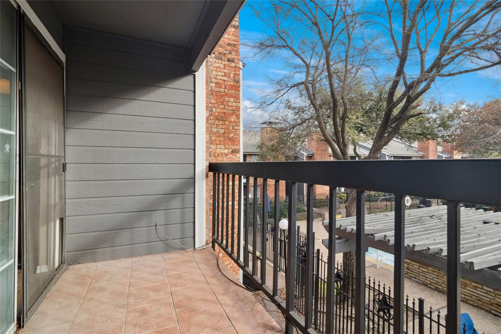 18333 Roehampton Drive, Unit 224 Dallas, TX 75252 - Photo 14 of 24 a view of outdoor space with deck