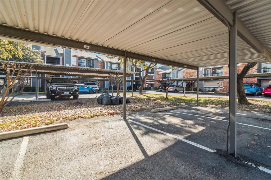 18333 Roehampton Drive, Unit 224 Dallas, TX 75252 - Photo 17 of 24 a view of a swimming pool with a patio