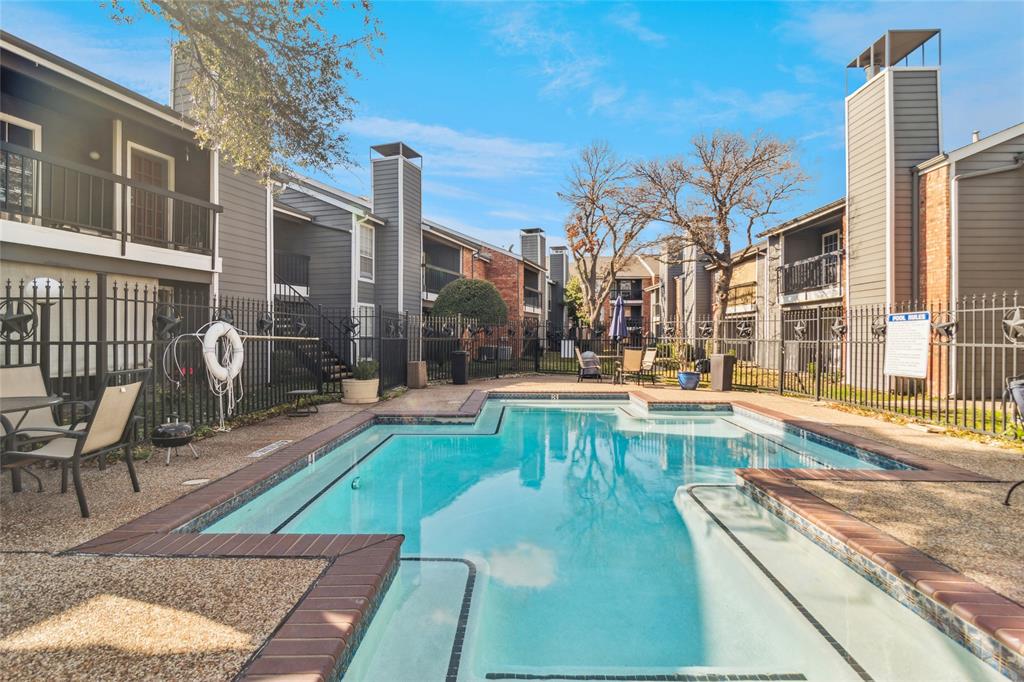 18333 Roehampton Drive, Unit 224 Dallas, TX 75252 - Photo 23 of 24 a view of a swimming pool with outdoor seating