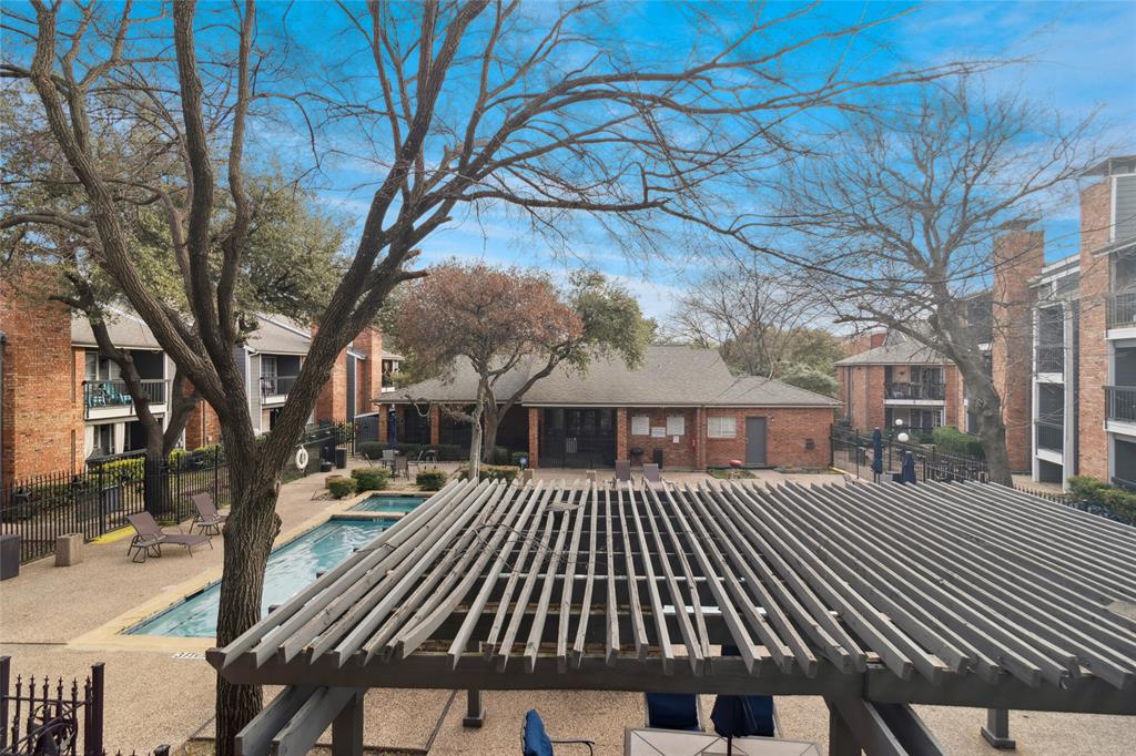 18333 Roehampton Drive, Unit 224 Dallas, TX 75252 - Photo 3 of 24 front view of a house with a yard