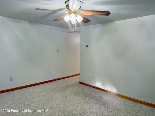 a view of a room with a chandelier