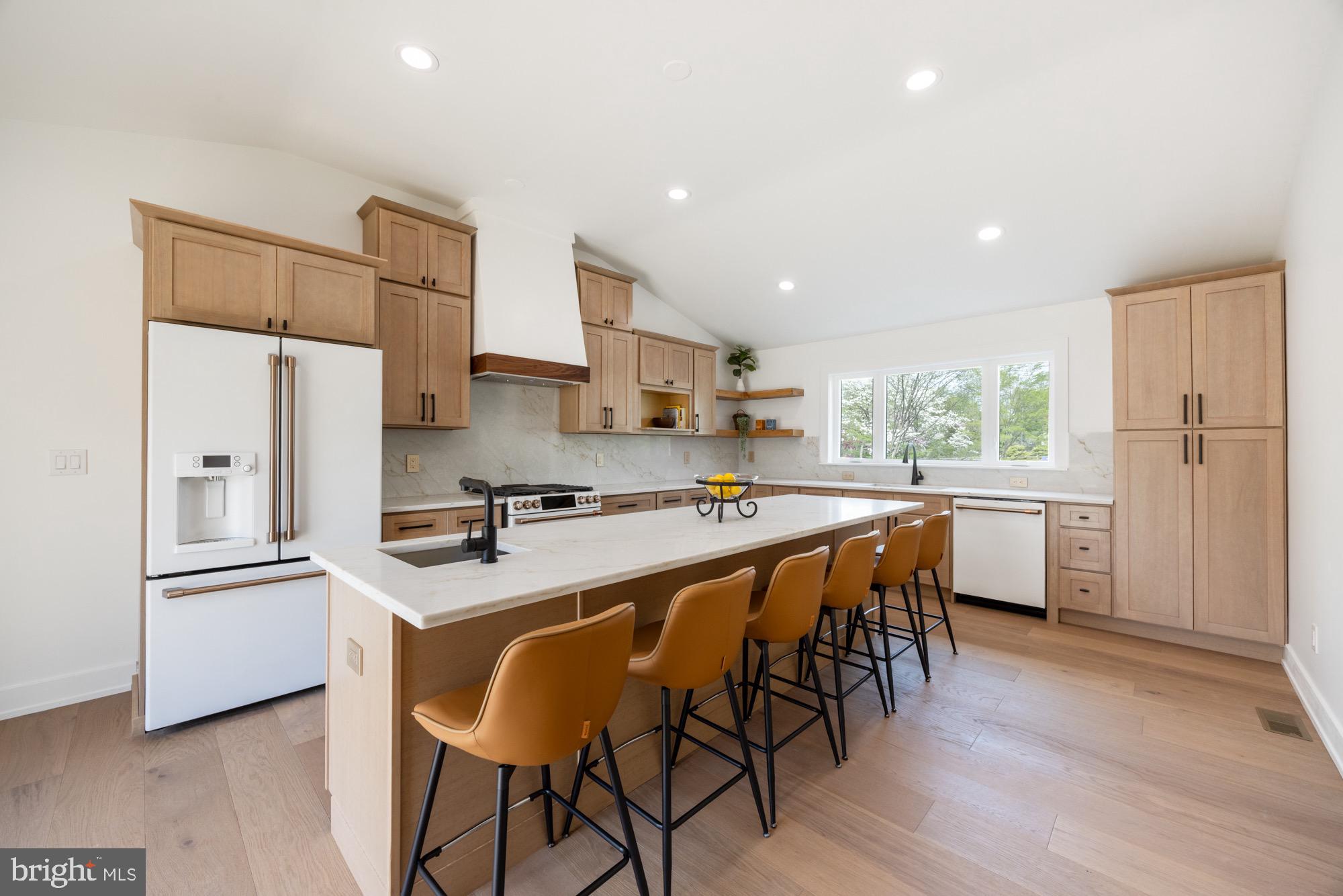 48 Mountainview Court Ewing, NJ 08628 - Photo 16 of 63 a kitchen with white cabinets and stainless steel appliances