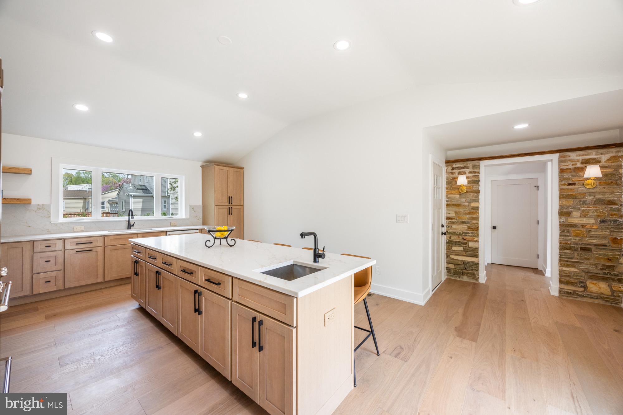 48 Mountainview Court Ewing, NJ 08628 - Photo 17 of 63 a kitchen with a sink stove and cabinets