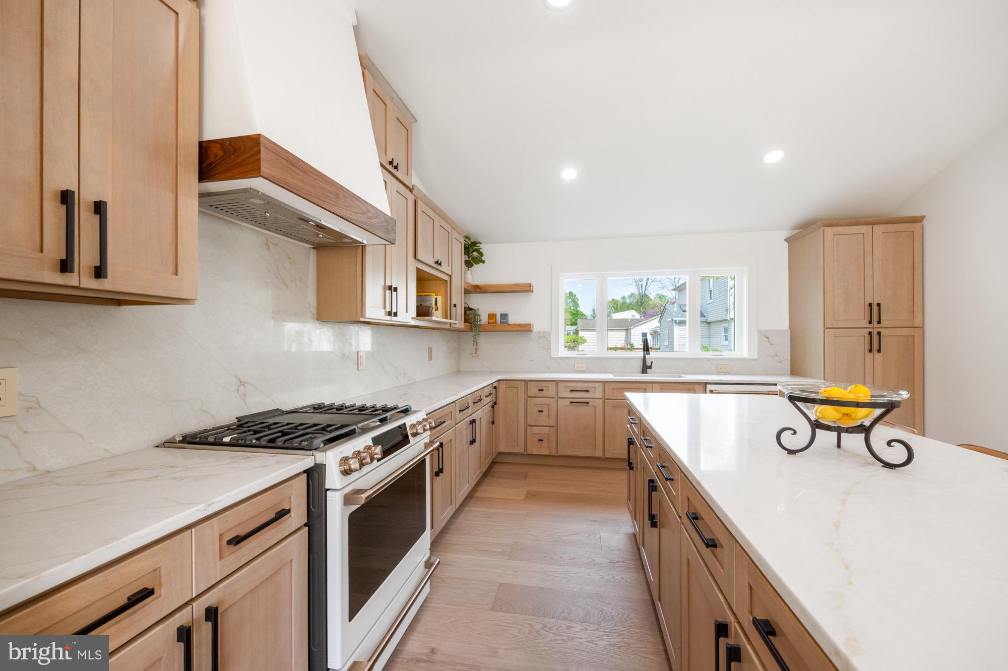 48 Mountainview Court Ewing, NJ 08628 - Photo 18 of 63 a kitchen with a sink a stove and cabinets