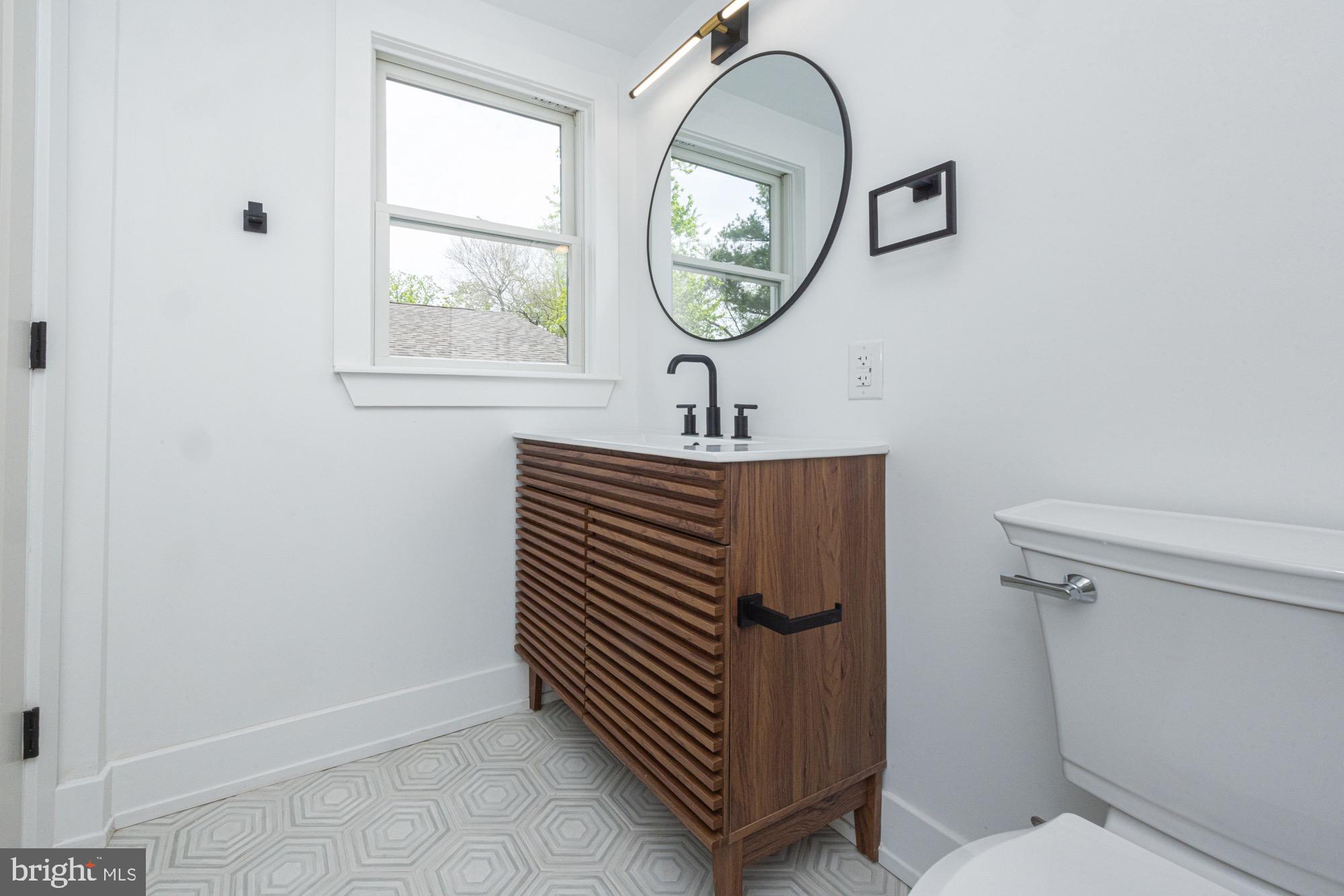 48 Mountainview Court Ewing, NJ 08628 - Photo 36 of 63 a view of a hallway with entryway wooden floor and front door