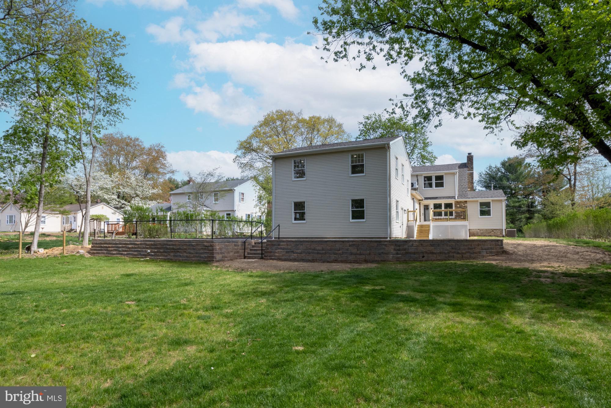 48 Mountainview Court Ewing, NJ 08628 - Photo 49 of 63 a view of a backyard with large trees