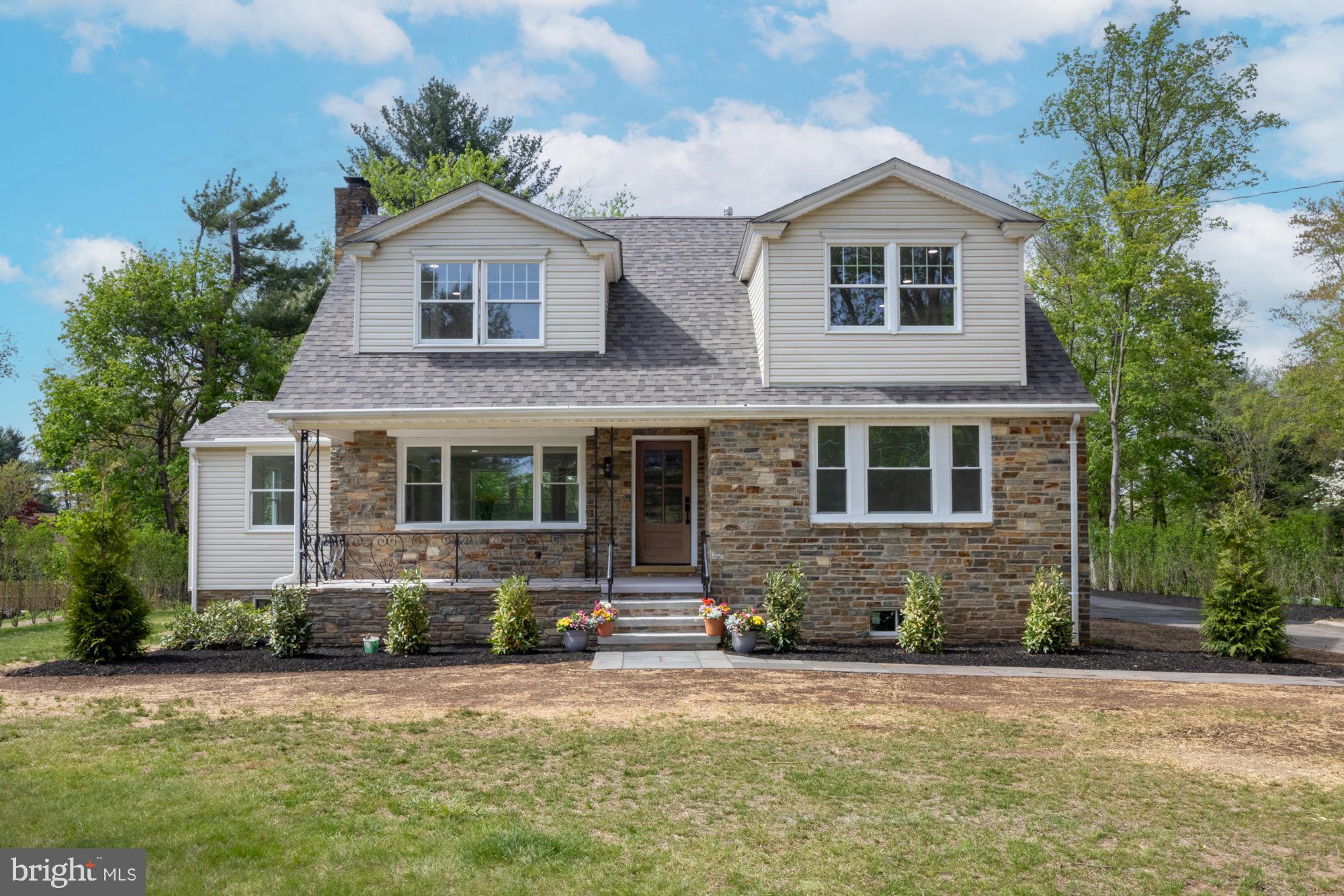 48 Mountainview Court Ewing, NJ 08628 - Photo 52 of 63 a front view of a house with a yard and garage