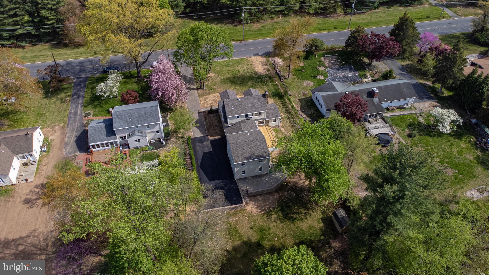 48 Mountainview Court Ewing, NJ 08628 - Photo 58 of 63 an aerial view of a house with outdoor space and lake view