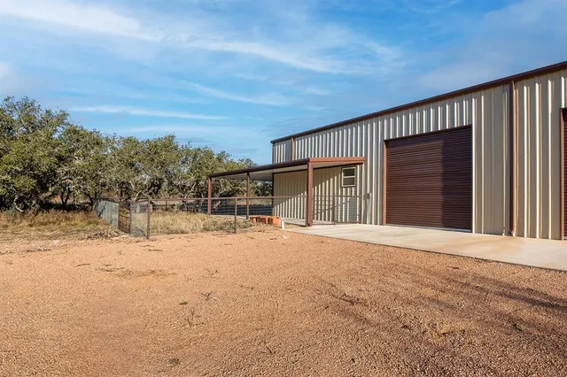a view of a balcony with furniture