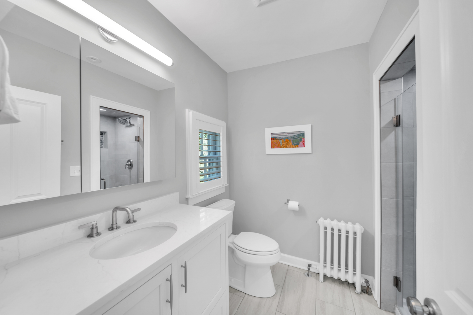 32 Otis Road Barrington Hills, IL 60010 - Photo 31 of 48 a bathroom with a toilet a sink and mirror