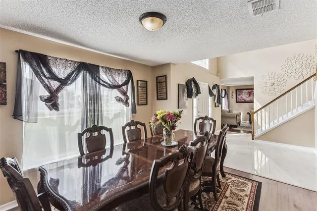 a view of a dining room with furniture